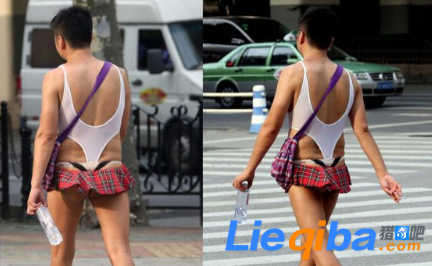 上海街头一男子打扮另类 下身迷你小短裙甚是妩媚_0