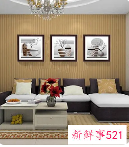 沙发背景墙在西面挂什么画好