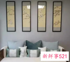 客厅沙发后挂什么画