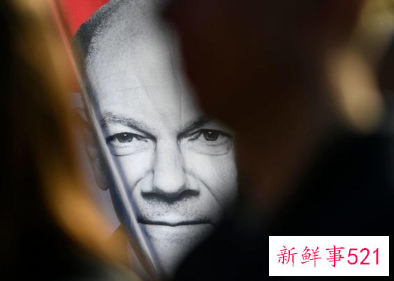 默克尔祝贺肖尔茨获胜