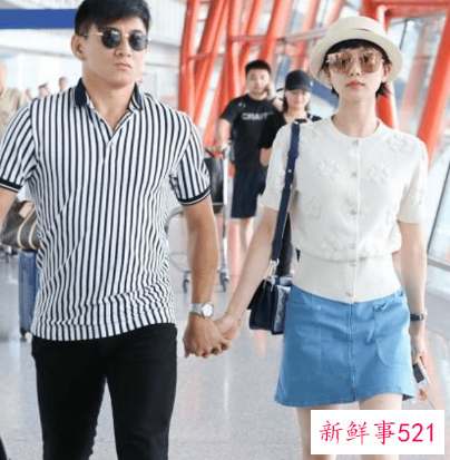 吴奇隆夫妇现身机场，不忘牵手秀恩爱