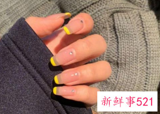 黄色指甲油显手白吗