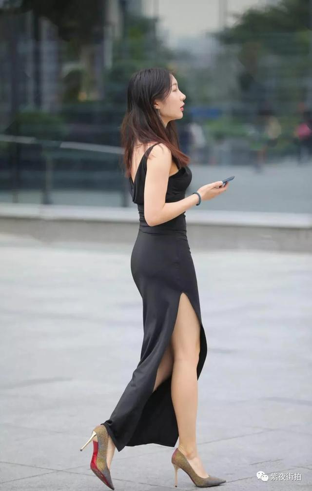 肉肉臀的黑色高开叉长裙美女，身材高挑匀称