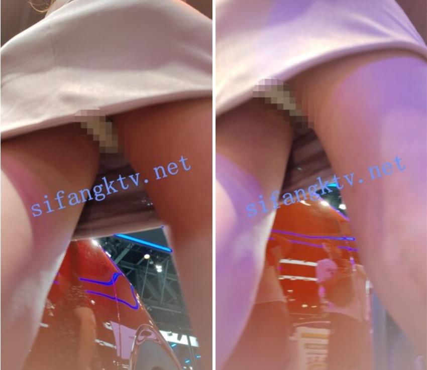 偷拍美女裙底风光成都车展银色连衣裙细高跟极品美女，白色窄内 UR级反差骚货黑丝筒袜配情趣开档内裤